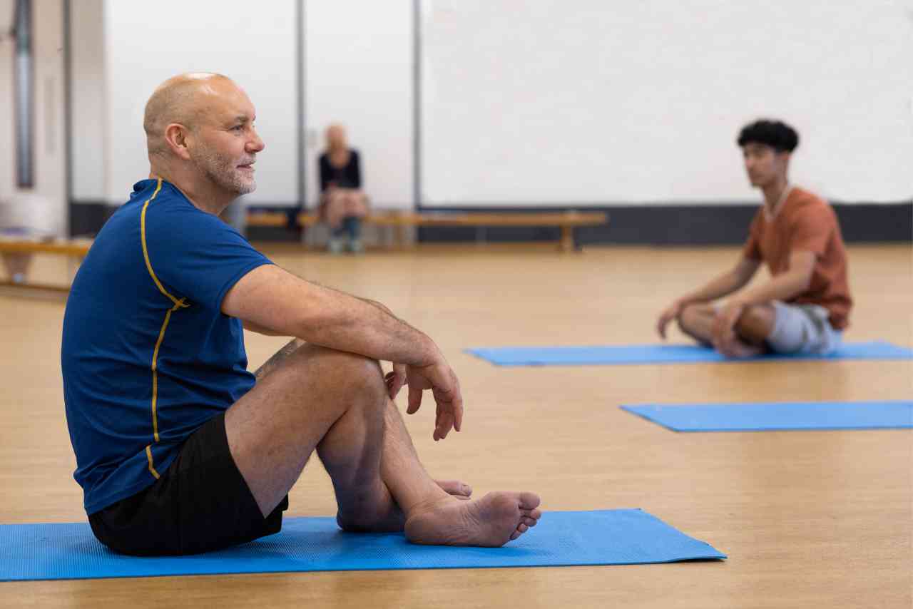 Man on blue mat